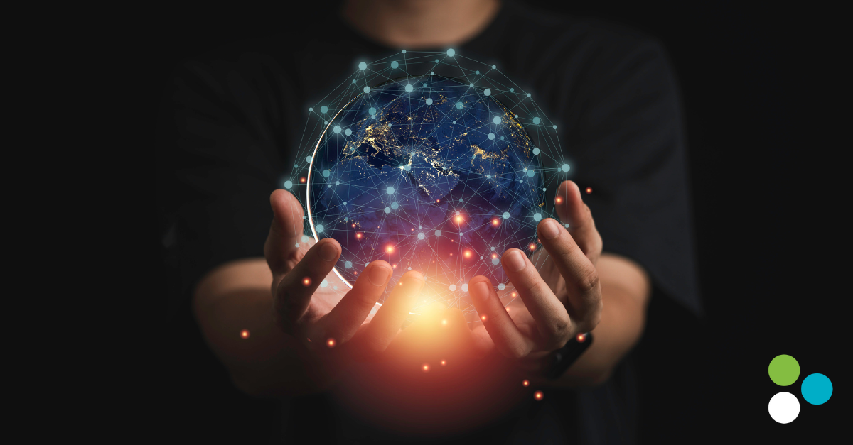 human hand holding holographic globe