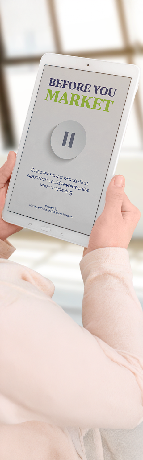 Womand holding e-reader with Before You Market cover visible